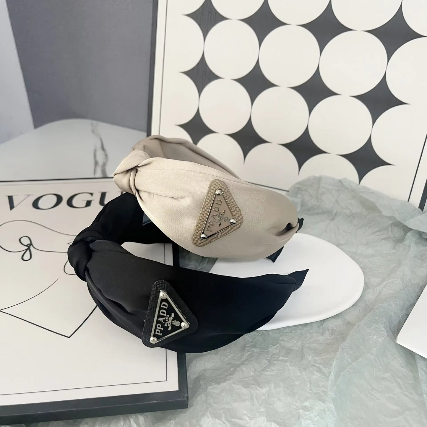Triangular-Shaped Knotting Wide-Edge Headband, a Fashionable and Elegant Twisted Hairband with a Knot Design.