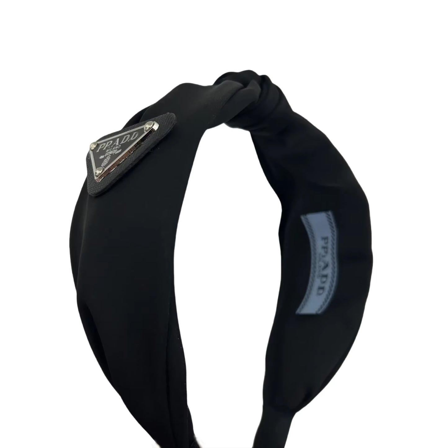 Triangular-Shaped Knotting Wide-Edge Headband, a Fashionable and Elegant Twisted Hairband with a Knot Design.
